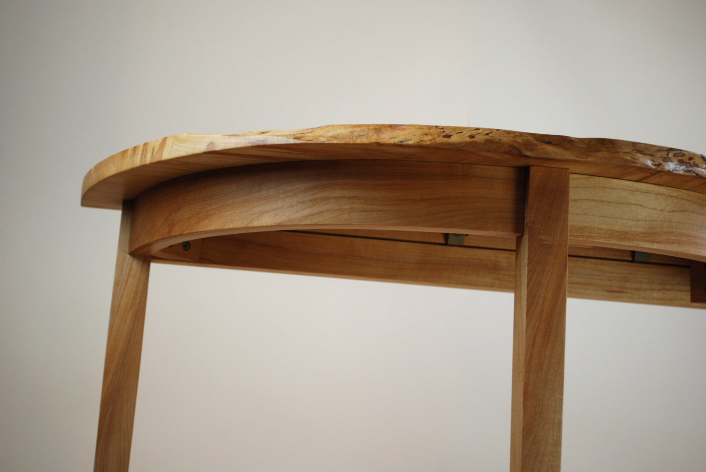 Figured Maple Round Front Three Legged Stand