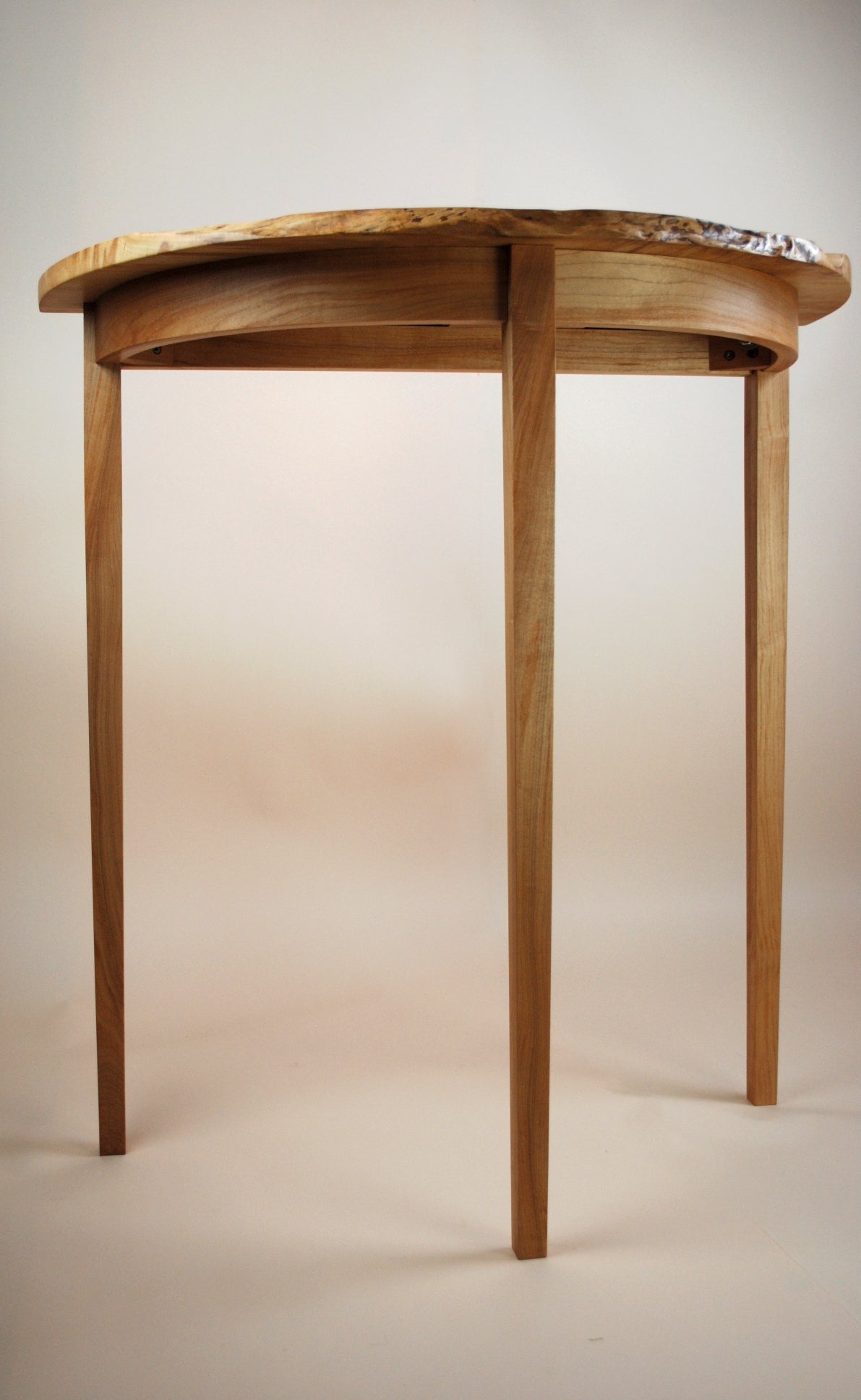 Figured Maple Round Front Three Legged Stand